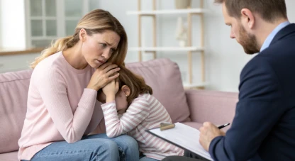 Attorney taking notes while a mother comforts her daughter